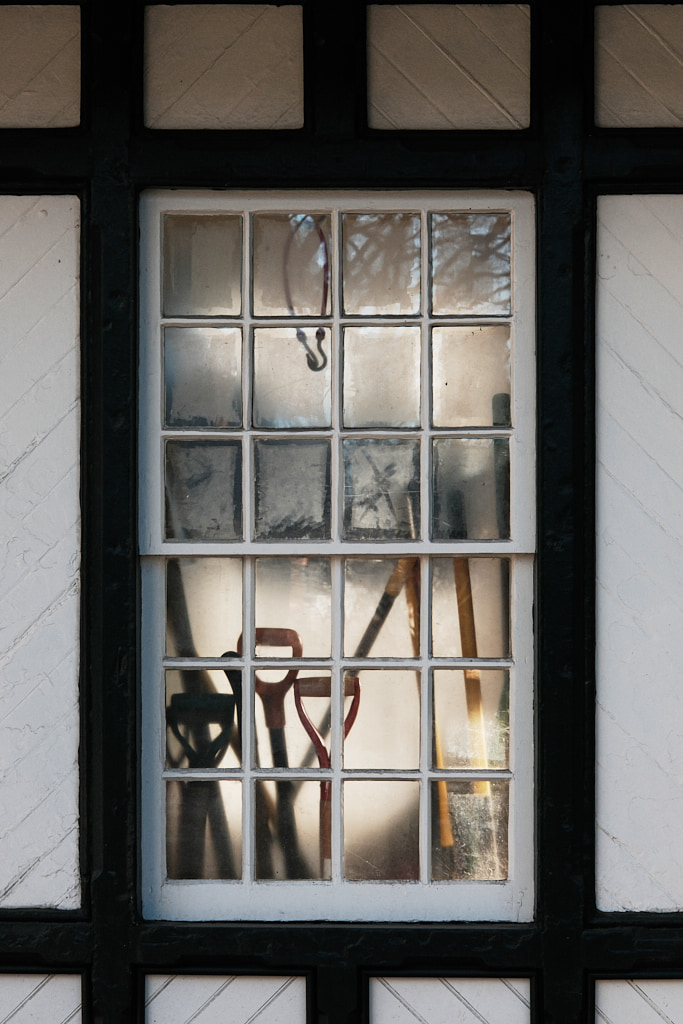 Shovels in a shed.