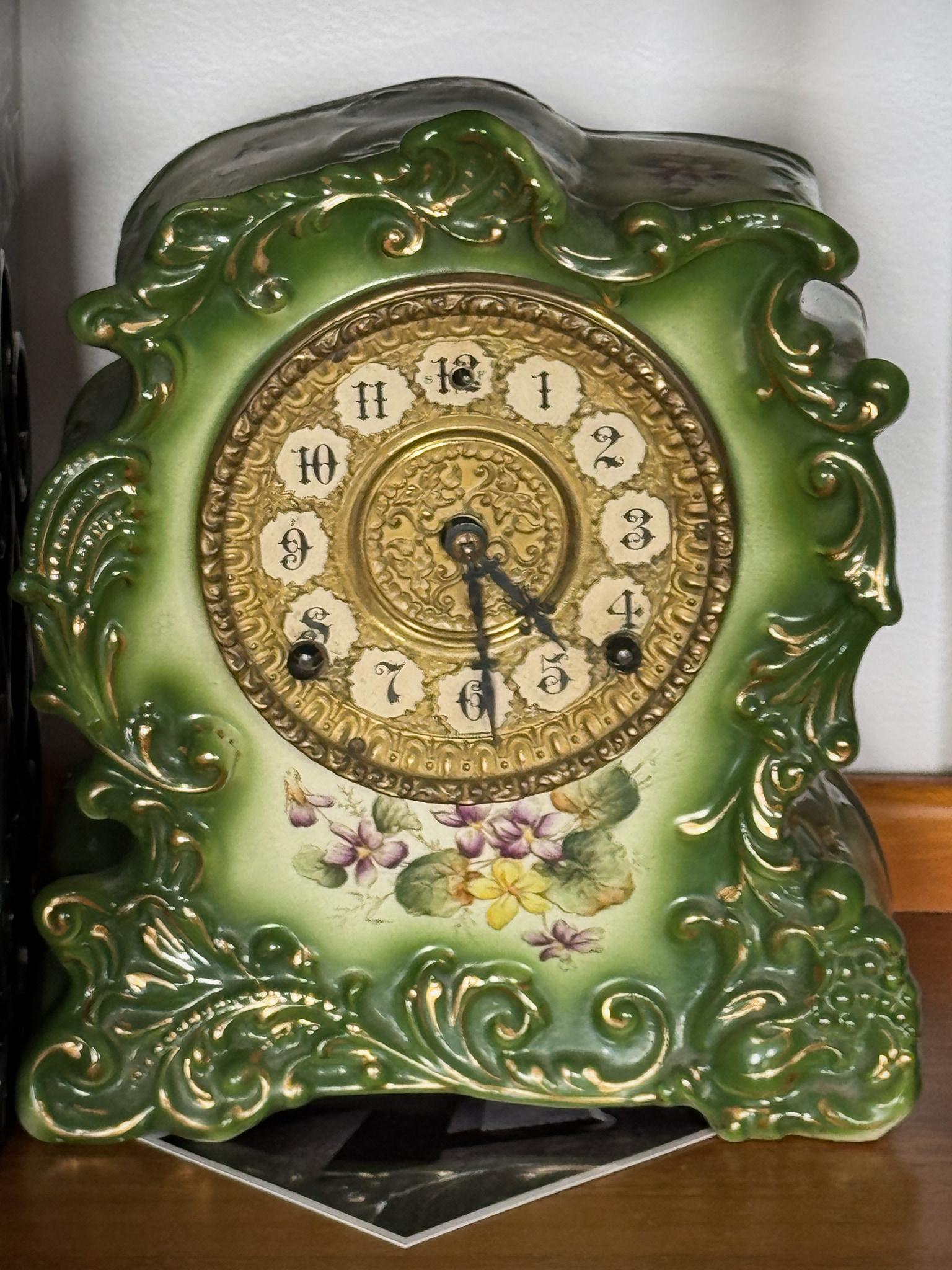 My grandparent's antique ceramic clock with hands stuck at 4:29.